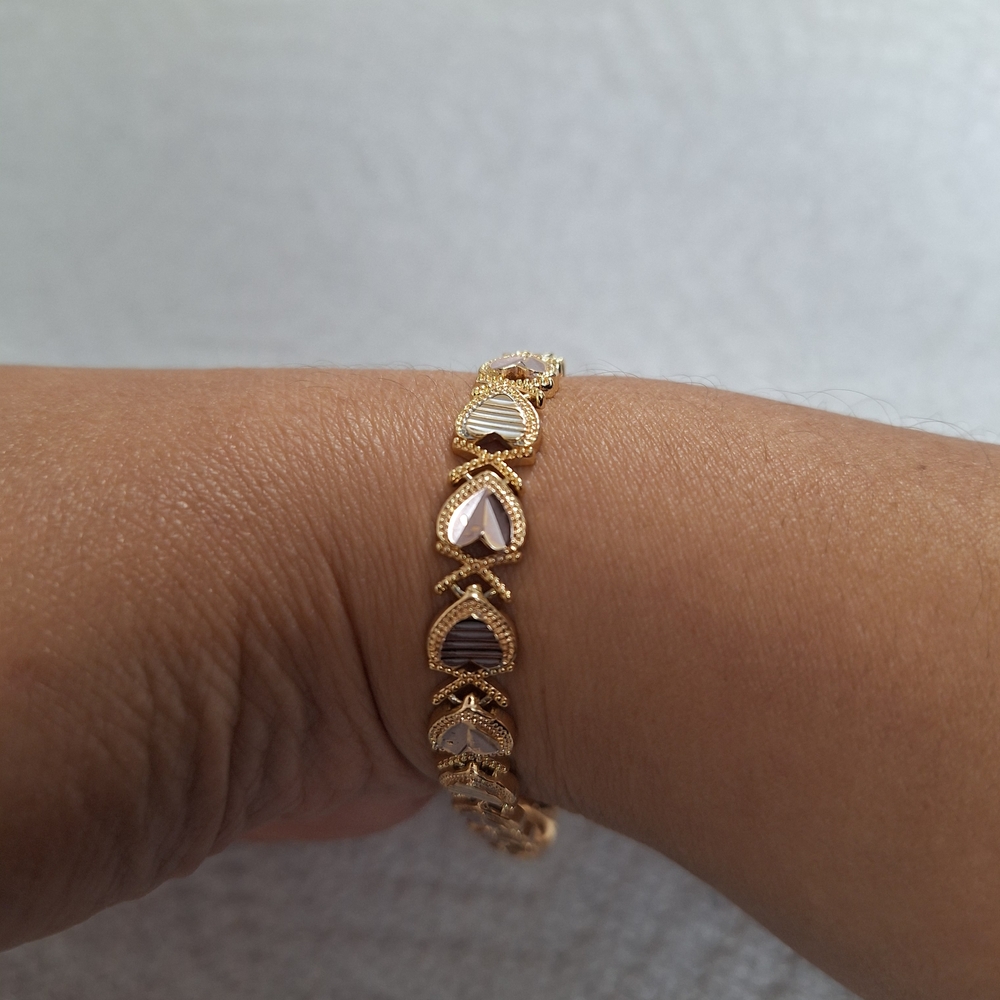 Elegant Gold Bracelet with Heart Accents